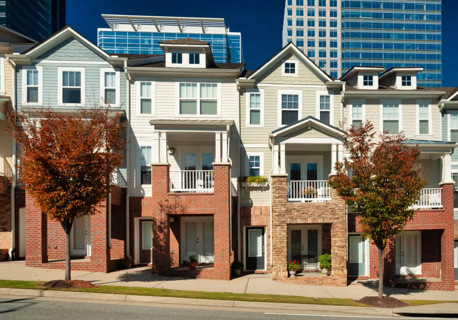 Townhouses with autumn trees